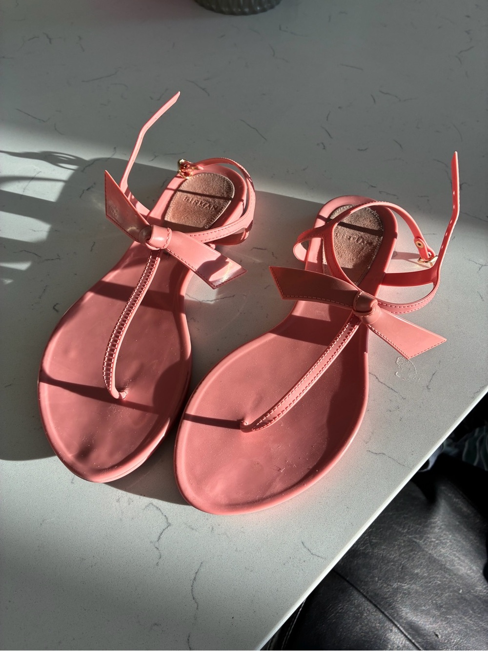 Alexandre Birman Coral Pink T-Strap Sandals with Bow Accent